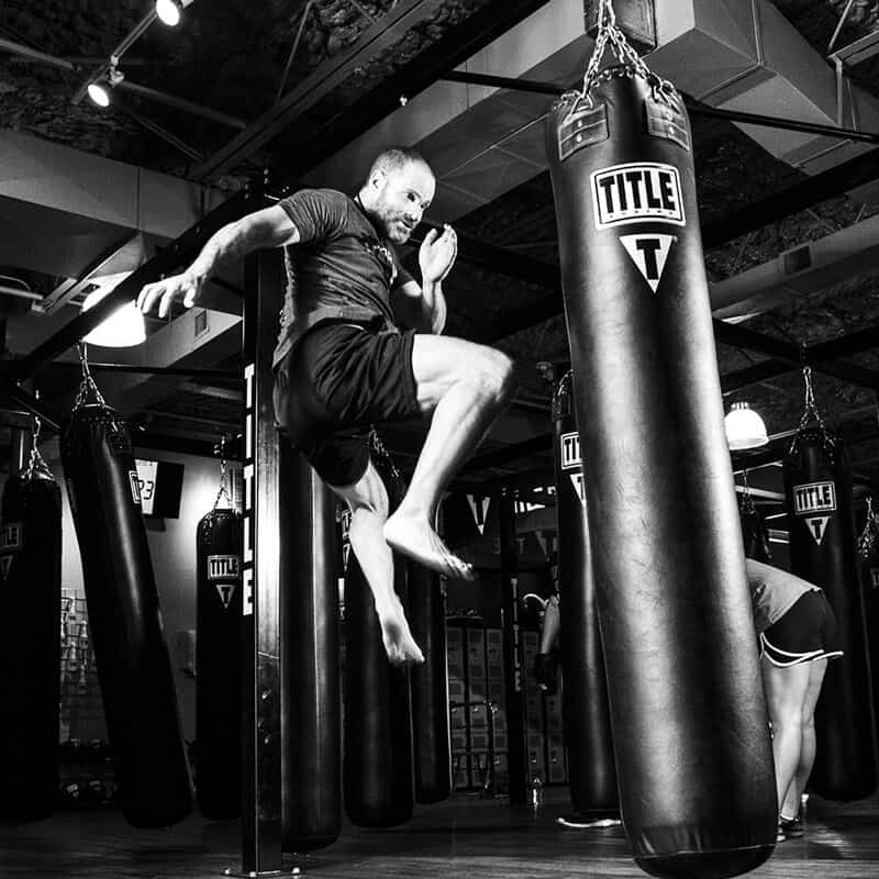 Mixed Martial Arts Lessons for Adults in Louisville  KY - Flying Knee Black and White MMA